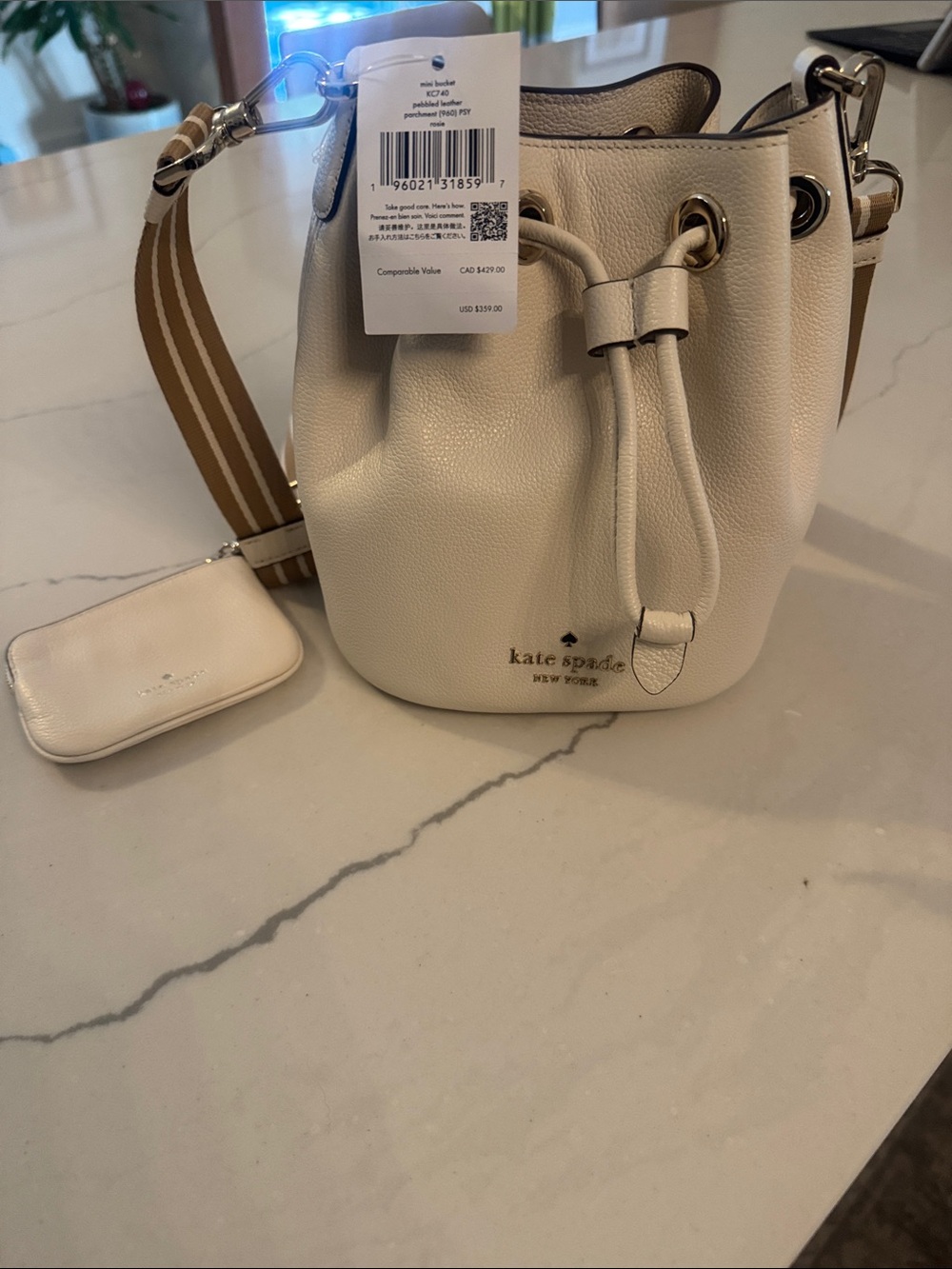kate spade cream leather drawstring mini bucket bag with tan striped strap